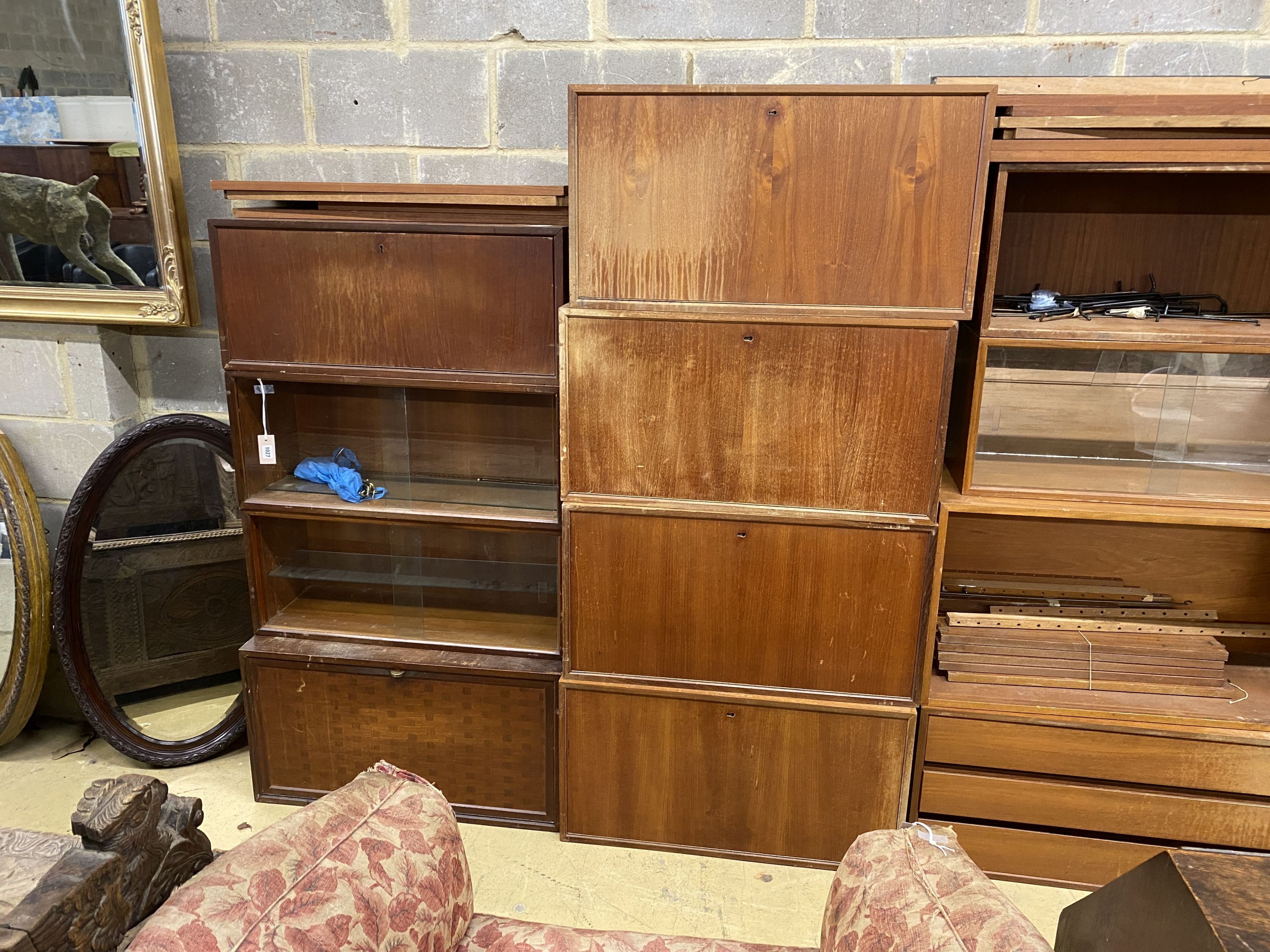 Three mid century teak modular wall systems by Poul Cadovious, Tapley and Staples ladder backs